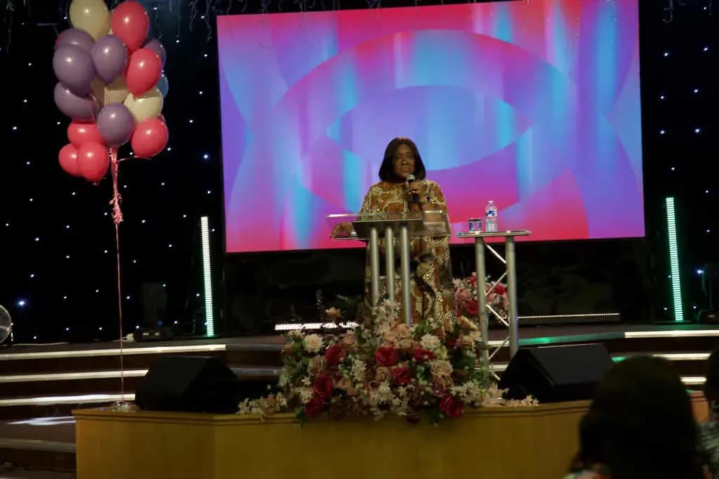 Interior worship space at RCCG Victory House London with stage, podium and large screen