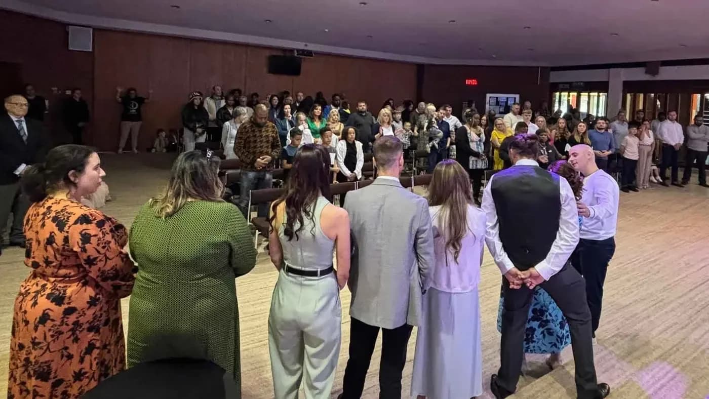 Congregation gathered in the LBC Birmingham worship hall during a Sunday service