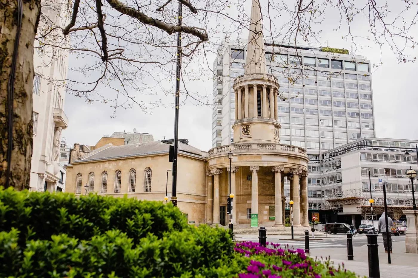 Exterior of All Souls Langham Place church with its distinctive circular columned portico and spire