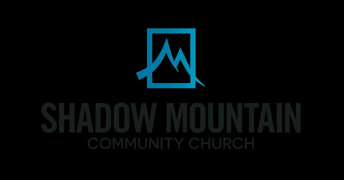 Shadow Mountain Community Church logo with mountain icon
