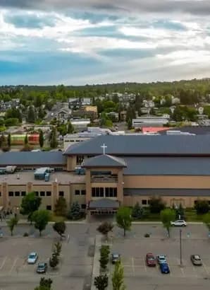 Aerial exterior view of Centre Street Church building with cross